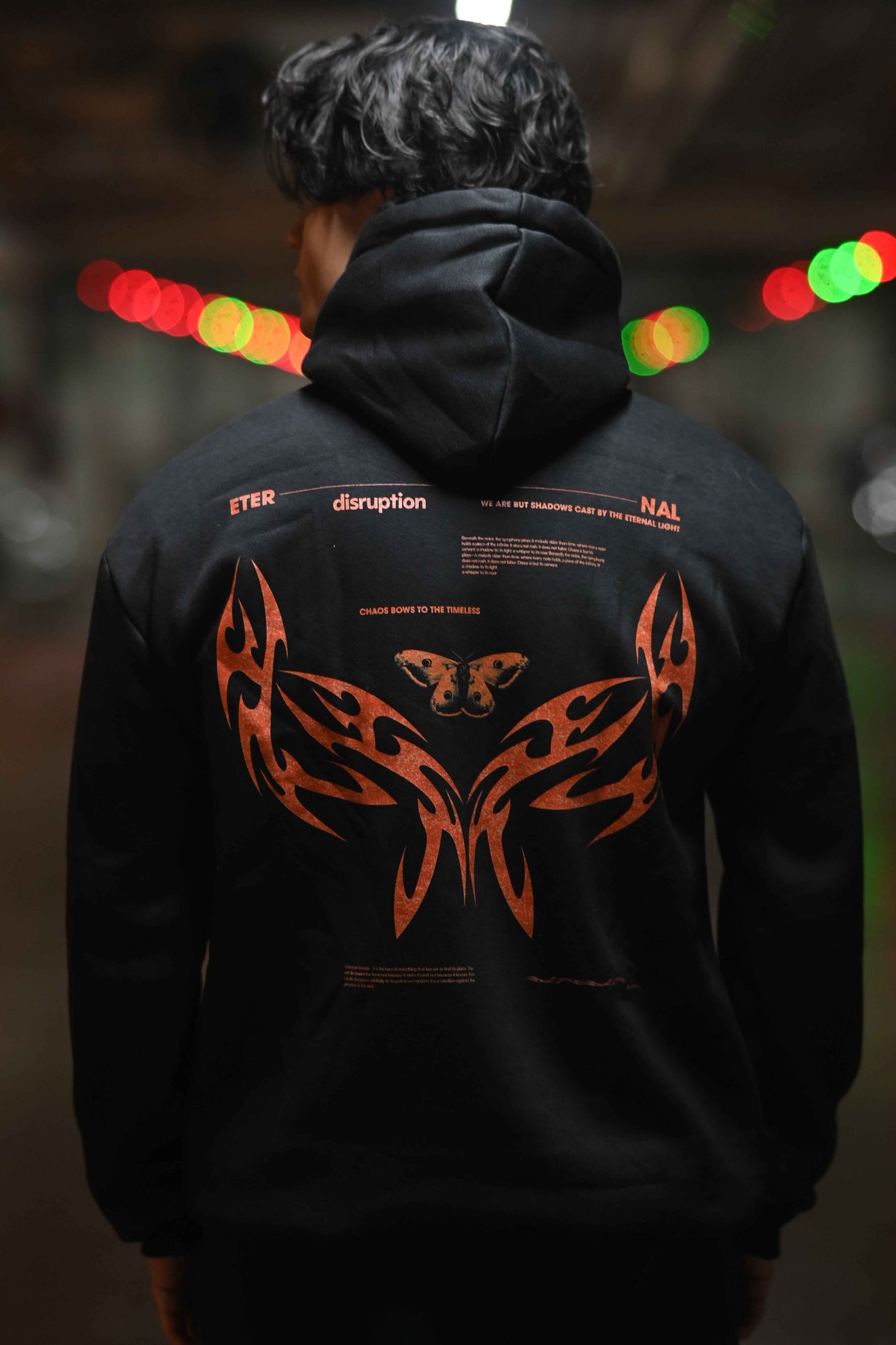 My Store Eternal hoodie in black featuring unique butterfly and flame graphics on the back